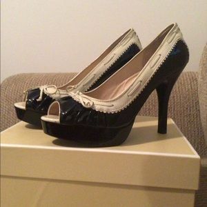 Black and white never worn high heel Michael Kors
